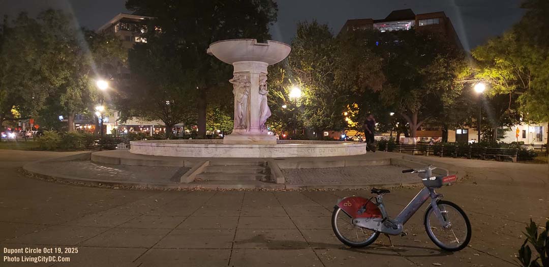 Dupont Circle at night with fountain and Electric Bike