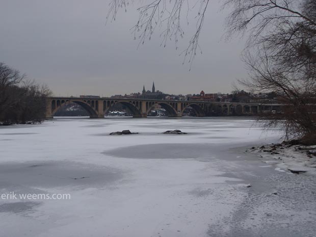 Ice and Snow atop the Potomac - Georgetown University and Key Bridge in Distance