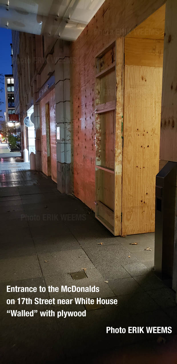 The 17th Street McDonalds walled with plywood