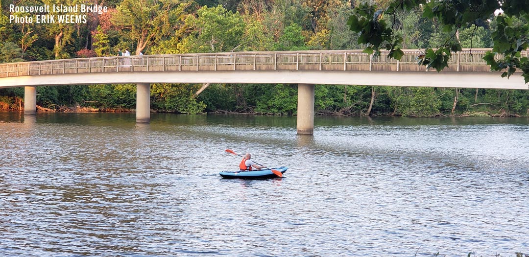 Canoe Paddling under the bridge at Roosevelt Island