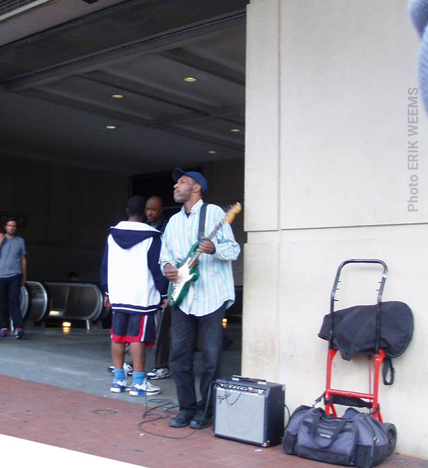 Playing music at the Metro Entrance