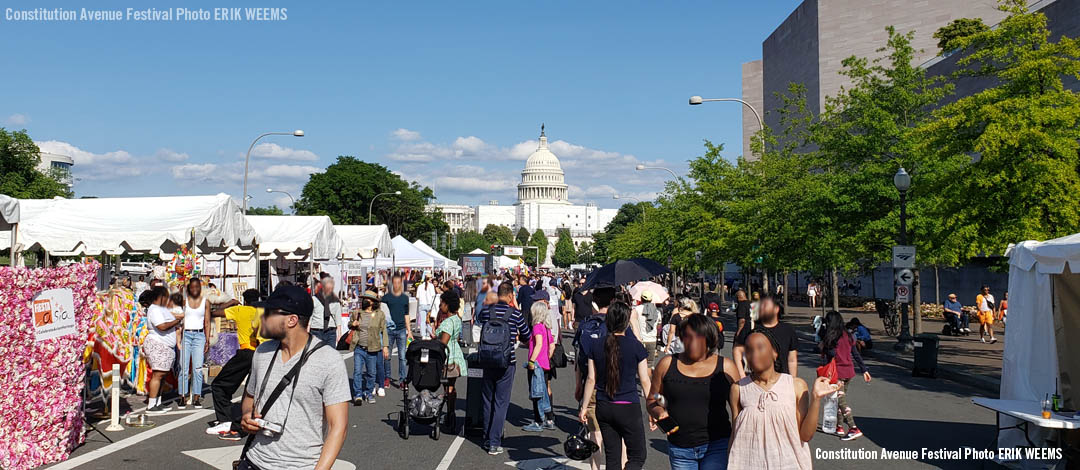 Festival on Constitutional Avenue with Capitol Building in distance